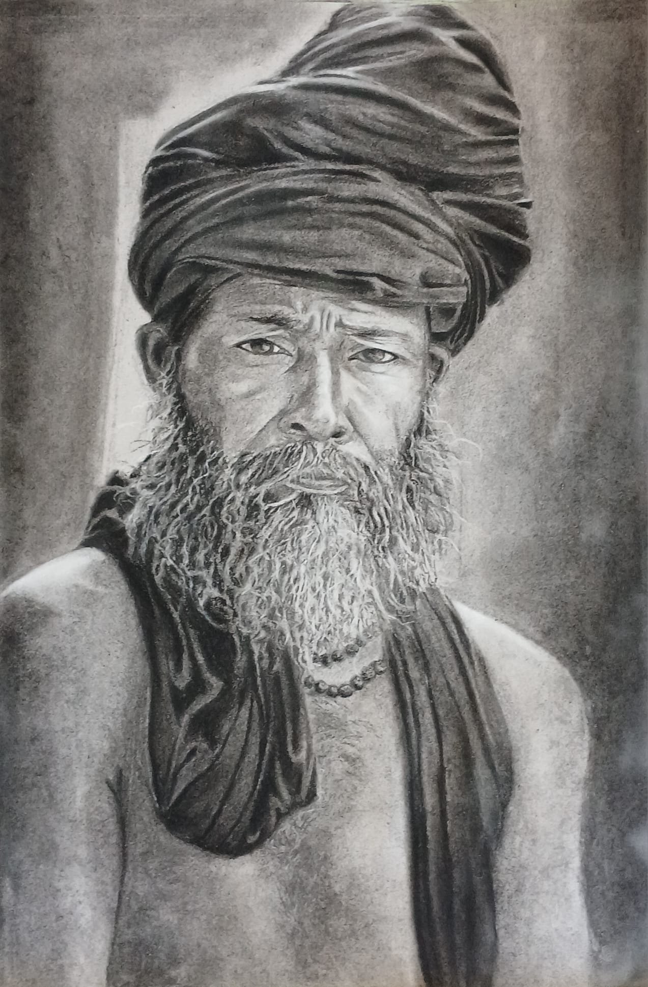 Portrait au fusain d'un homme au turban et à la barbe