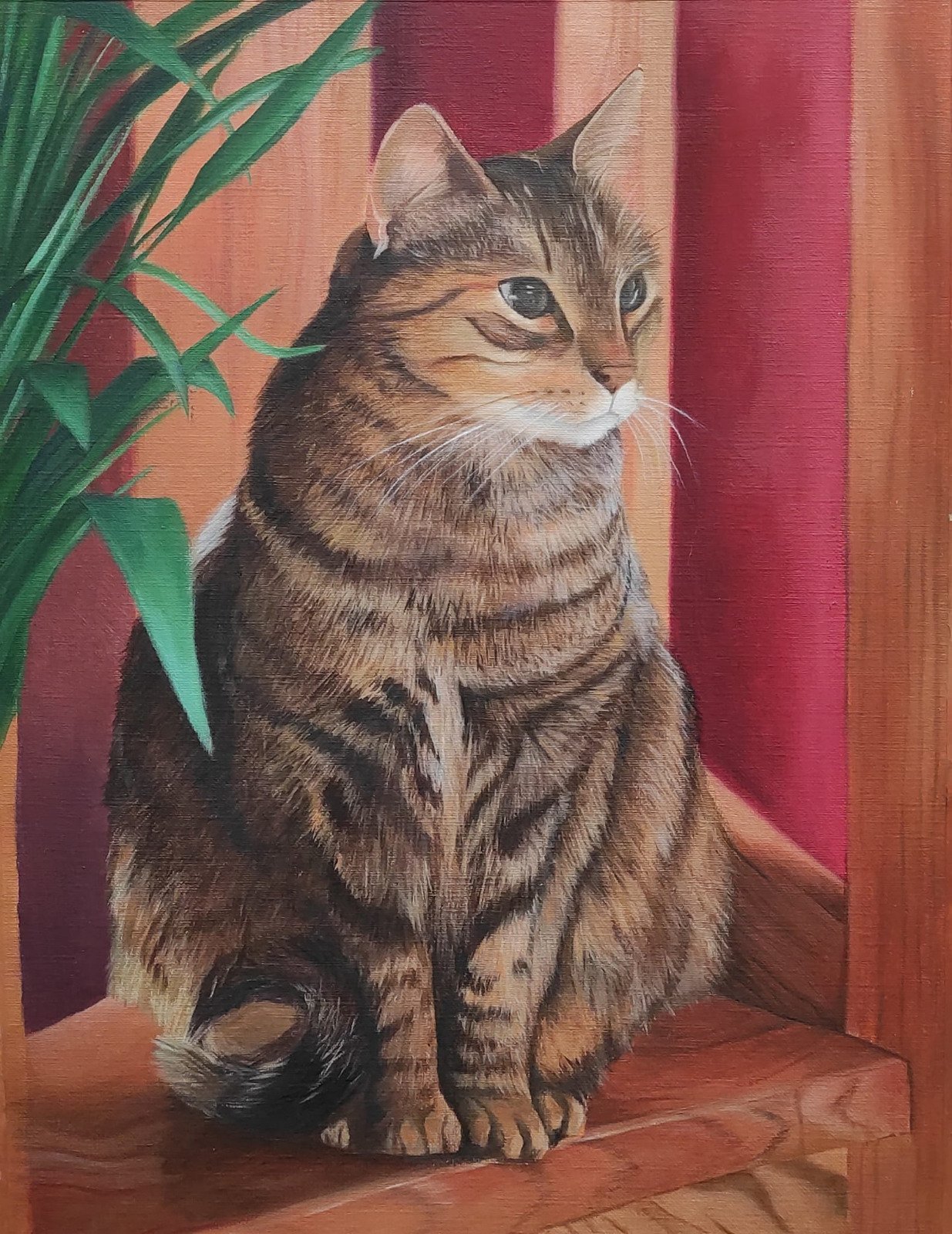 Portrait à l'huile d'un chat tigré assis près d'une plante